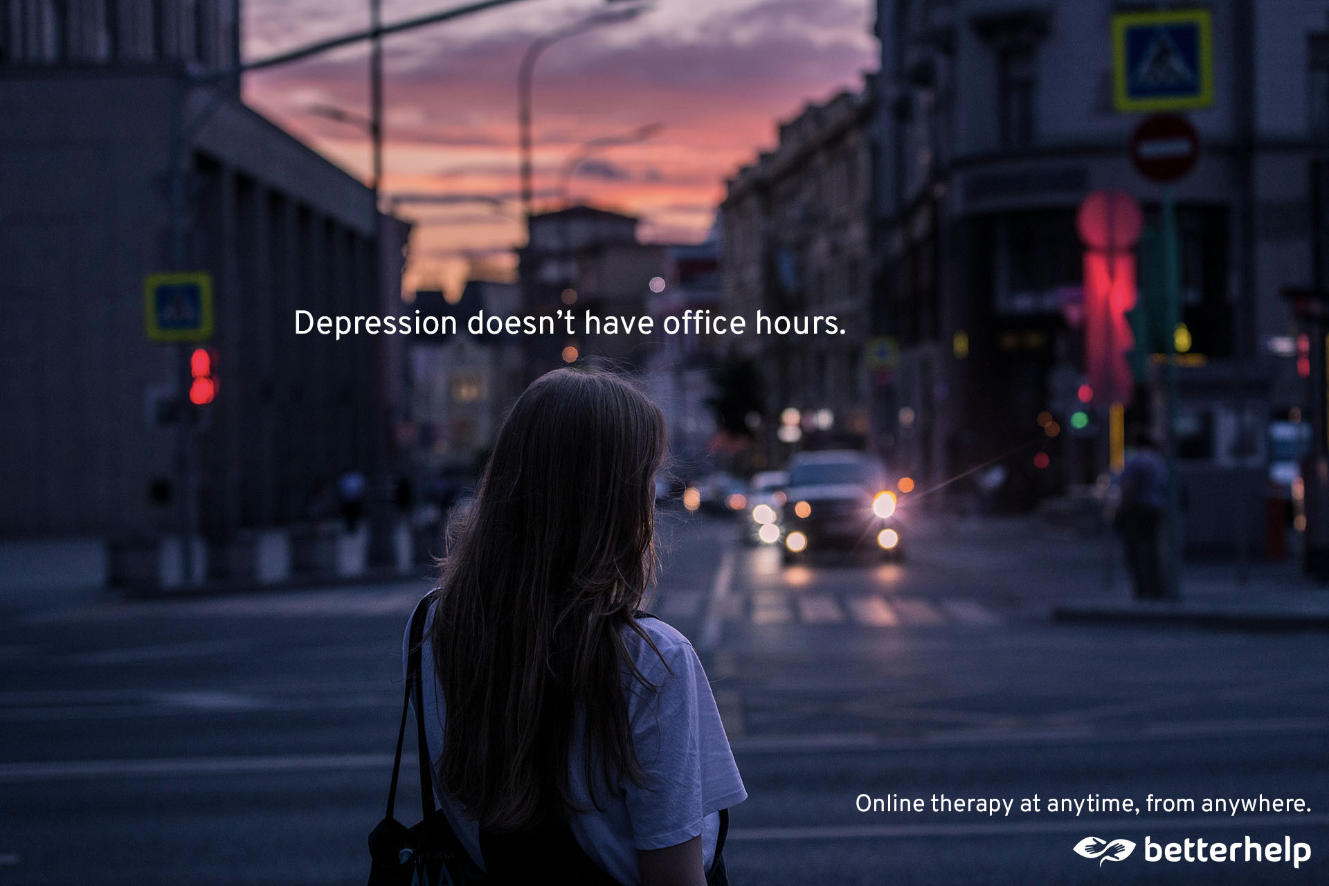 BetterHelp ad showing a young woman standing on a city street at sunset with headline 'Depression doesn't have office hours.' and tagline 'Online therapy at anytime, from anywhere. BetterHelp.'