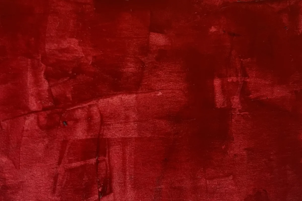 An abstract expressionist painting by Johann Naudé featuring deep crimson and dark red hues with visible, textured brushstrokes and layered blocky shapes.
