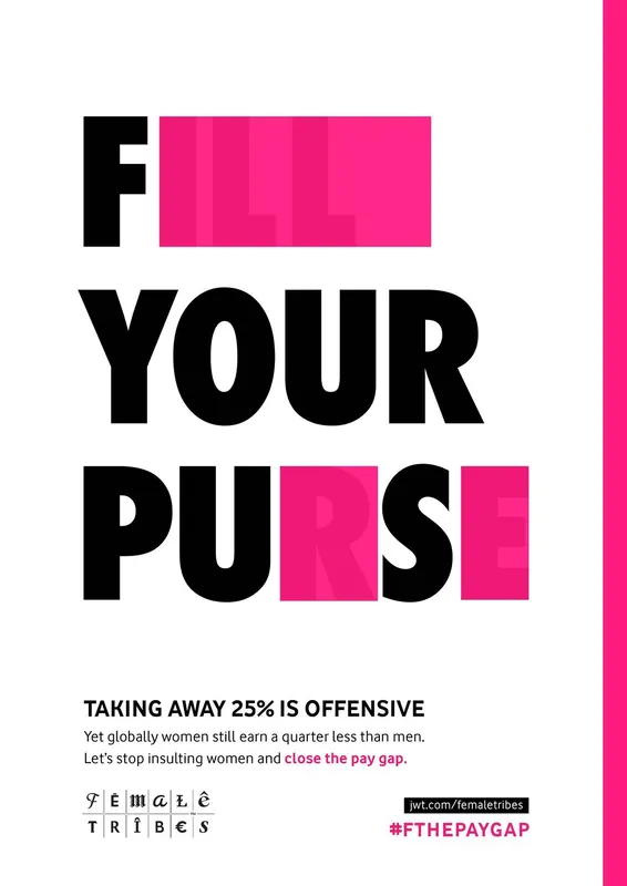 Female Tribes pay-gap ad with bold type spelling 'Fill your purse' (missing letter portions filled in pink) above 'Taking away 25% is offensive… close the pay gap.'